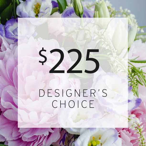 A bouquet of flowers with the words $ 2 2 5 designer 's choice in front.