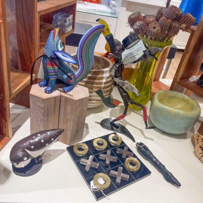 A table with various items on it including cookies and other objects.